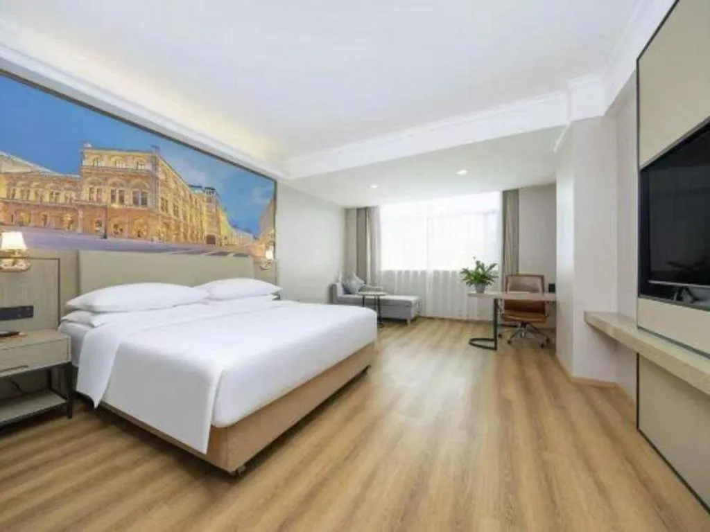 Bed in Vienna Hotel Yongzhou Dong'an High-Speed Railway Station
