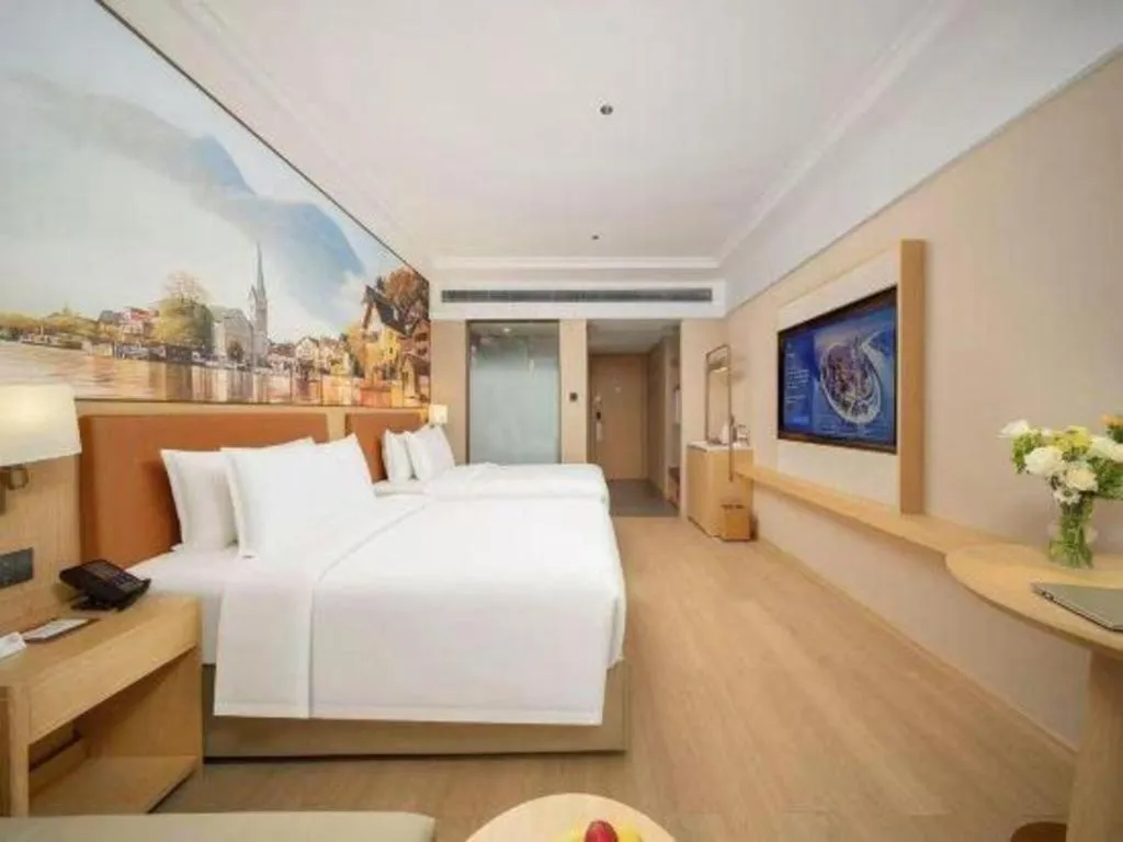 Bed in Vienna Hotel Yongzhou Dong'an High-Speed Railway Station