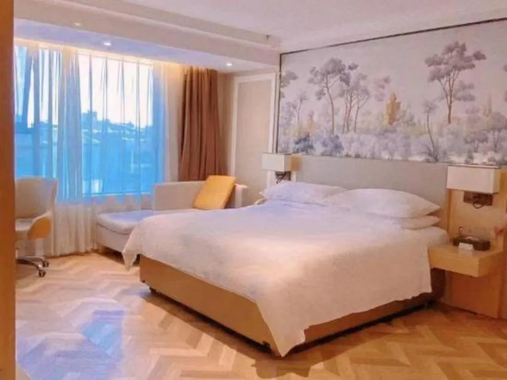 Bed in Vienna Hotel Yongzhou Dong'an High-Speed Railway Station