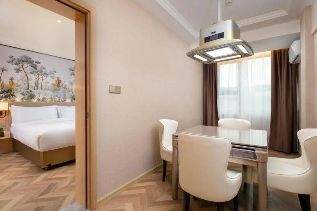 Bed in Vienna Hotel Yongzhou Dong'an High-Speed Railway Station