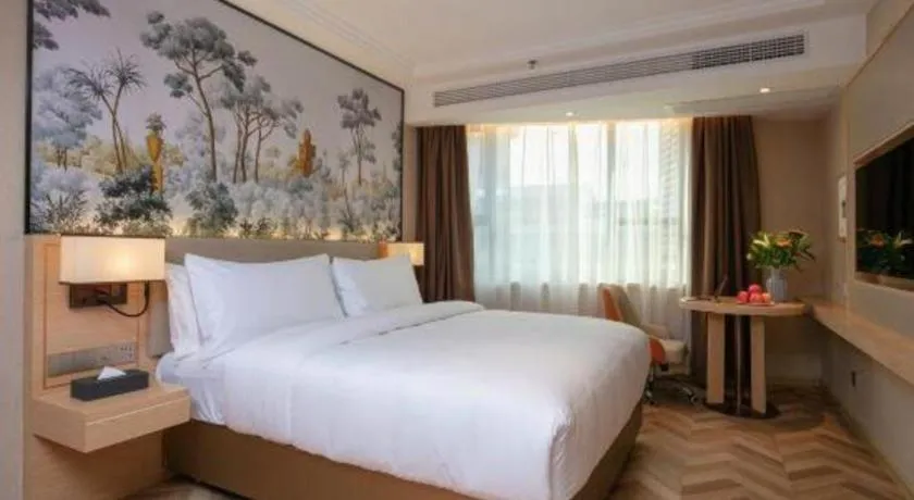 Bed in Vienna Hotel Yongzhou Dong'an High-Speed Railway Station