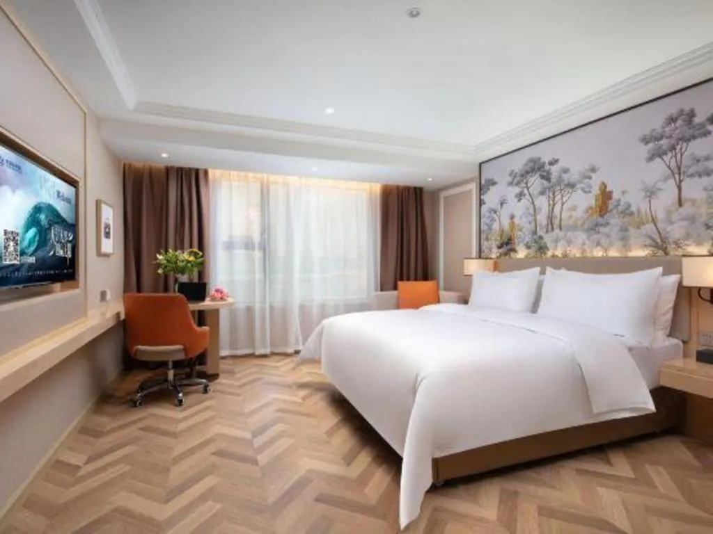 Bed in Vienna Hotel Yongzhou Dong'an High-Speed Railway Station