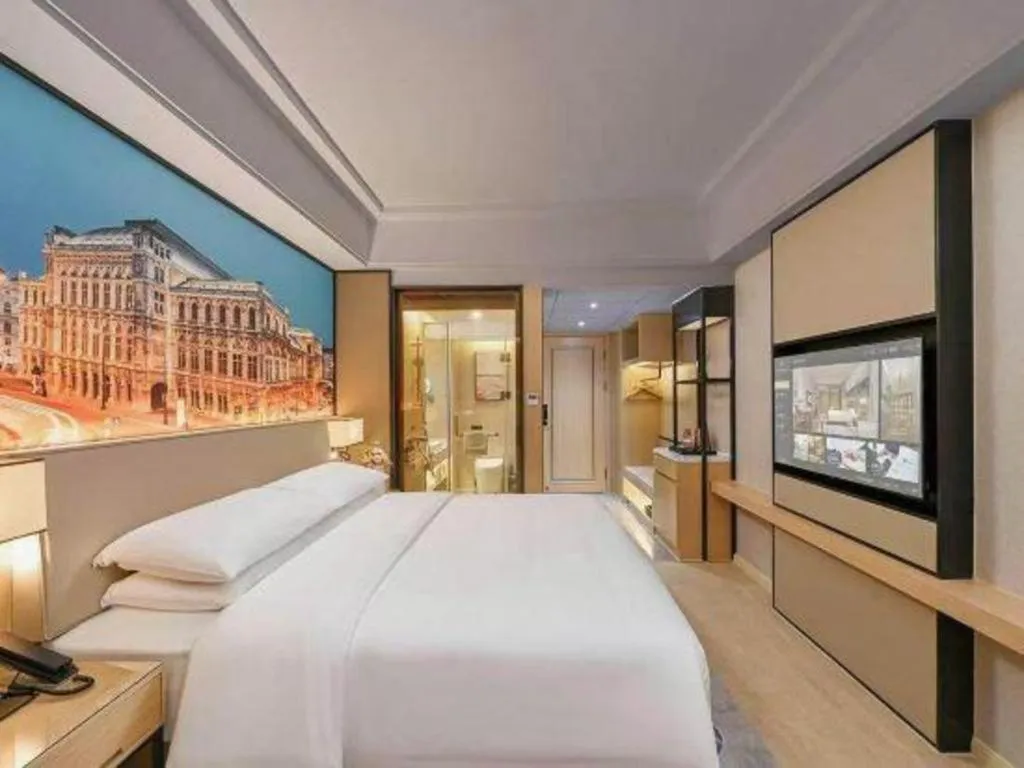 Bed in Vienna Hotel Yongzhou Dong'an High-Speed Railway Station