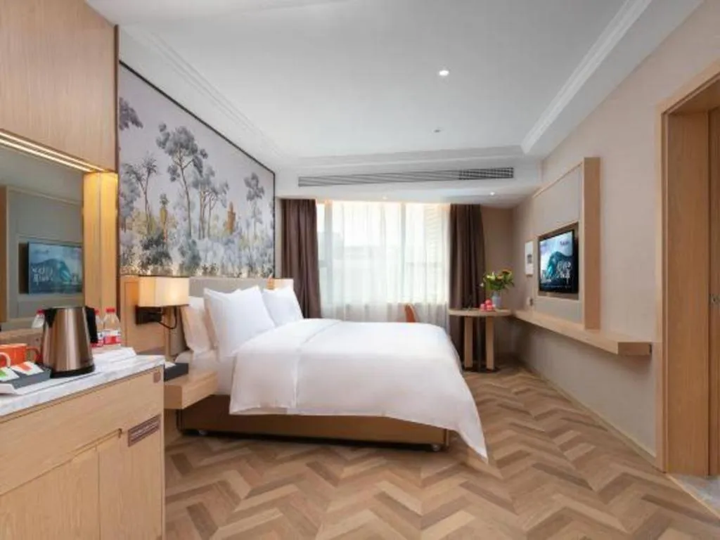 Bed in Vienna Hotel Yongzhou Dong'an High-Speed Railway Station