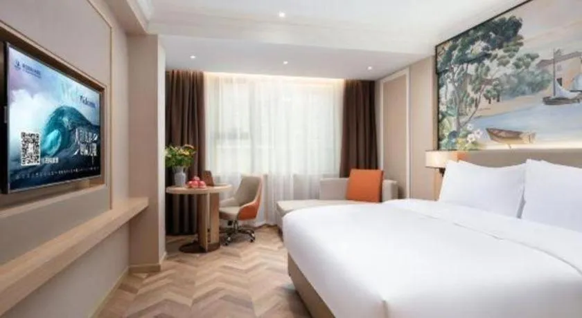 Bed in Vienna Hotel Yongzhou Dong'an High-Speed Railway Station