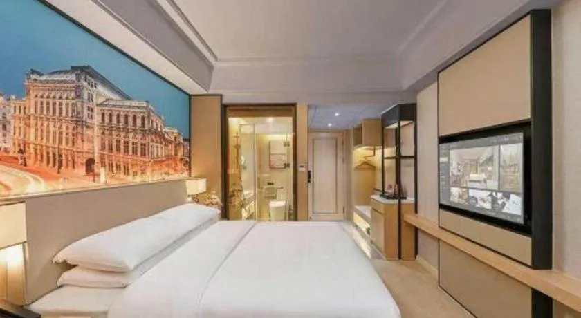 Bed in Vienna Hotel Yongzhou Dong'an High-Speed Railway Station