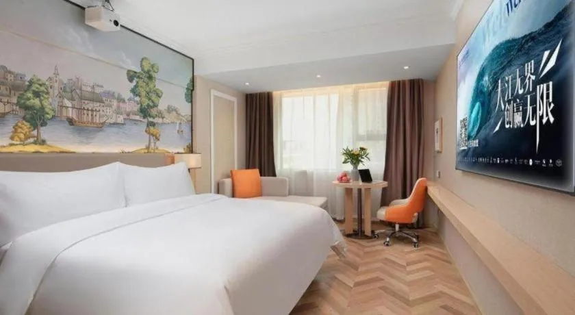 Bed in Vienna Hotel Yongzhou Dong'an High-Speed Railway Station