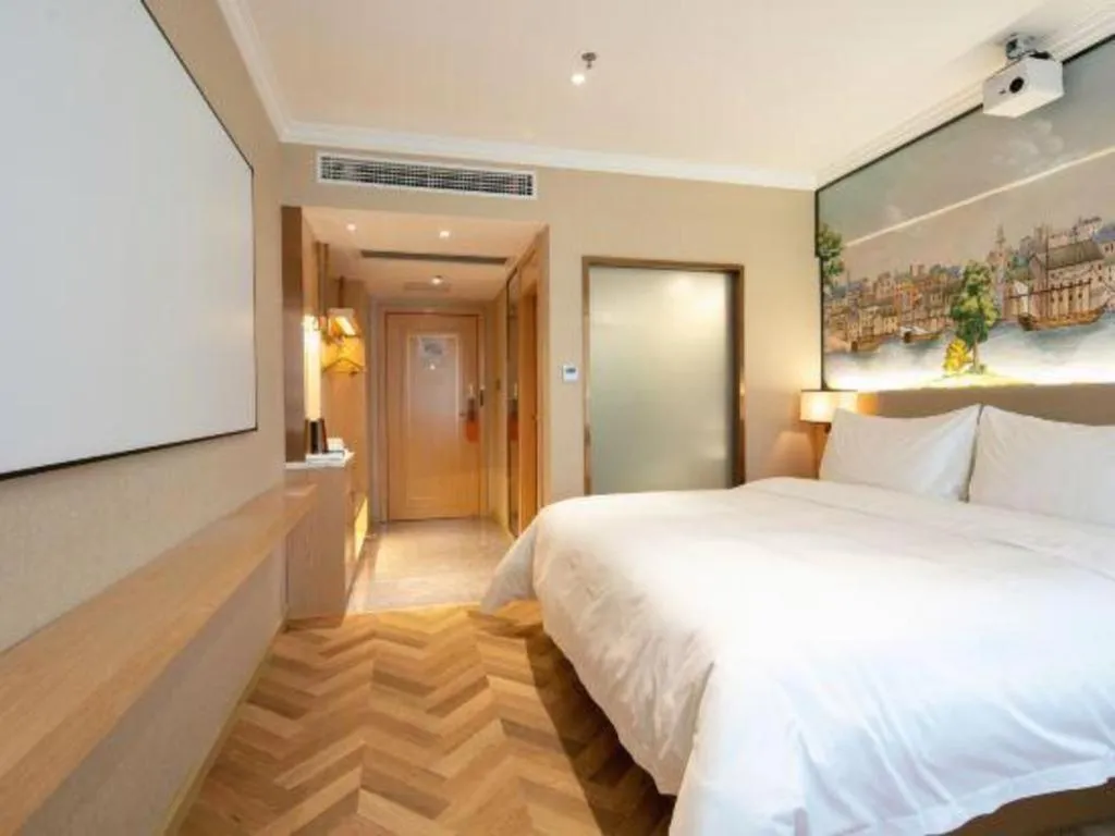 Bed in Vienna Hotel Yongzhou Dong'an High-Speed Railway Station