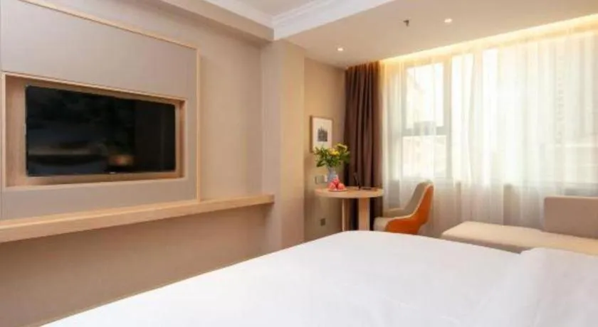 Bed in Vienna Hotel Yongzhou Dong'an High-Speed Railway Station