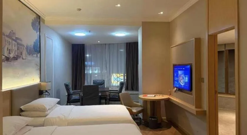 Bed in Vienna Hotel Yongzhou Dong'an High-Speed Railway Station