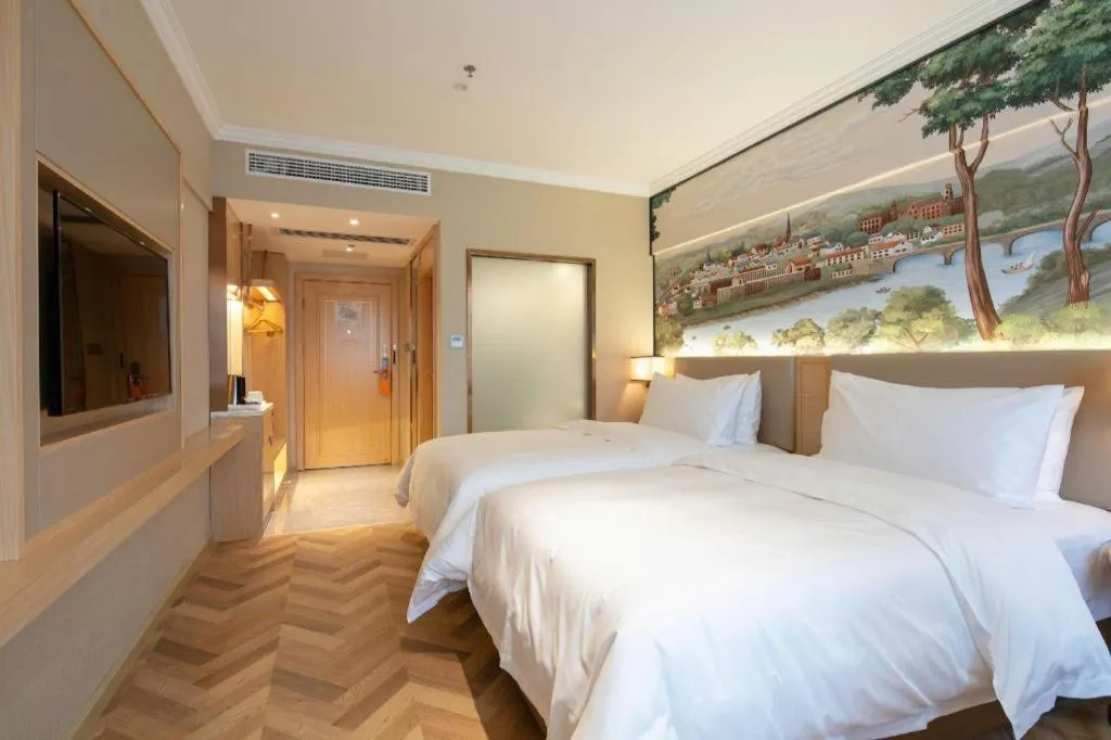 Bed in Vienna Hotel Yongzhou Dong'an High-Speed Railway Station