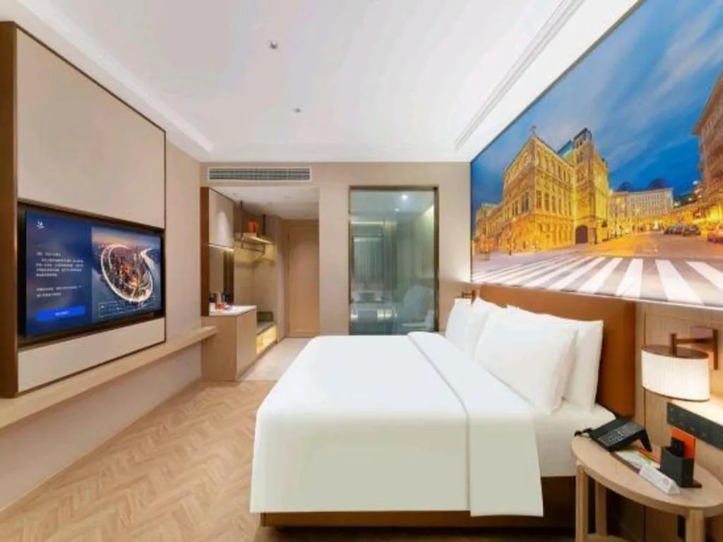 Bed in Vienna Hotel Yongzhou Dong'an High-Speed Railway Station