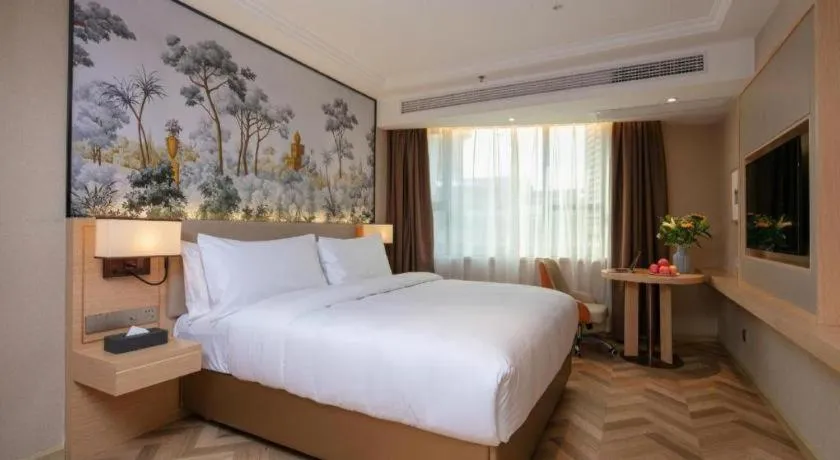 Bed in Vienna Hotel Yongzhou Dong'an High-Speed Railway Station