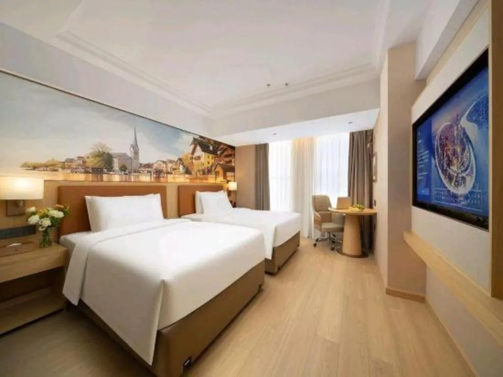 Bed in Vienna Hotel Yongzhou Dong'an High-Speed Railway Station