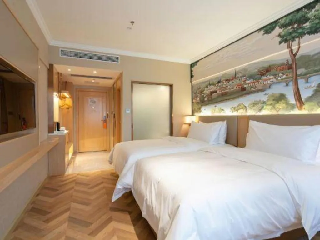 Bed in Vienna Hotel Yongzhou Dong'an High-Speed Railway Station