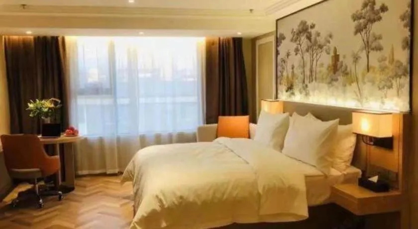 Bed in Vienna Hotel Yongzhou Dong'an High-Speed Railway Station