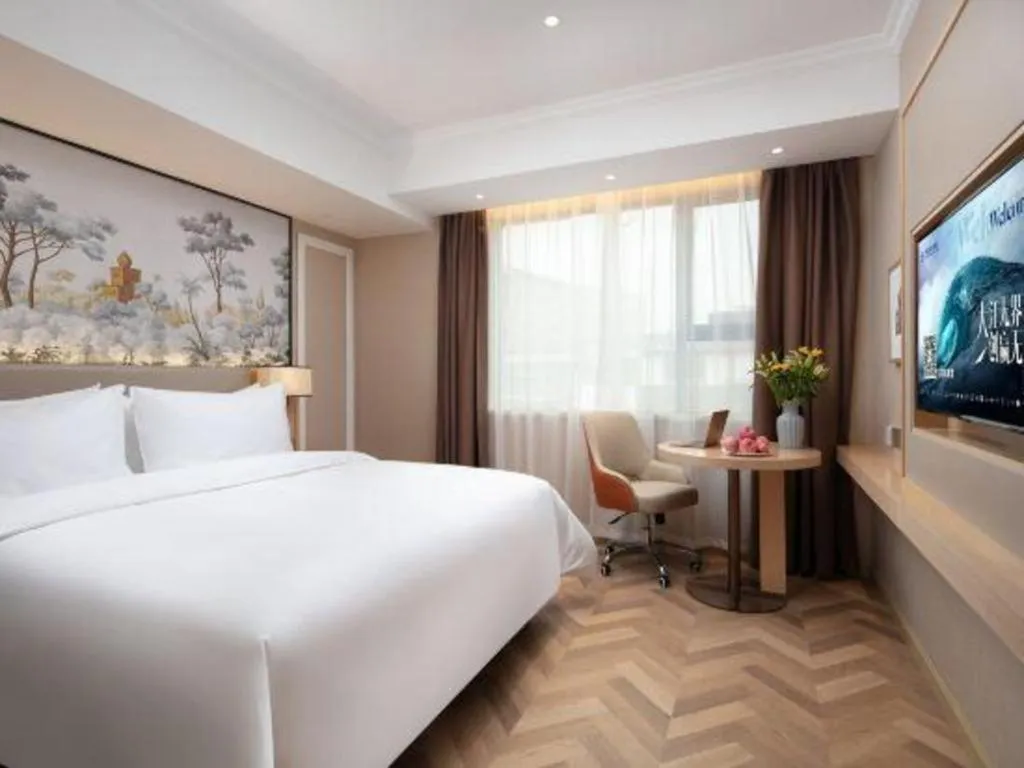 Bed in Vienna Hotel Yongzhou Dong'an High-Speed Railway Station