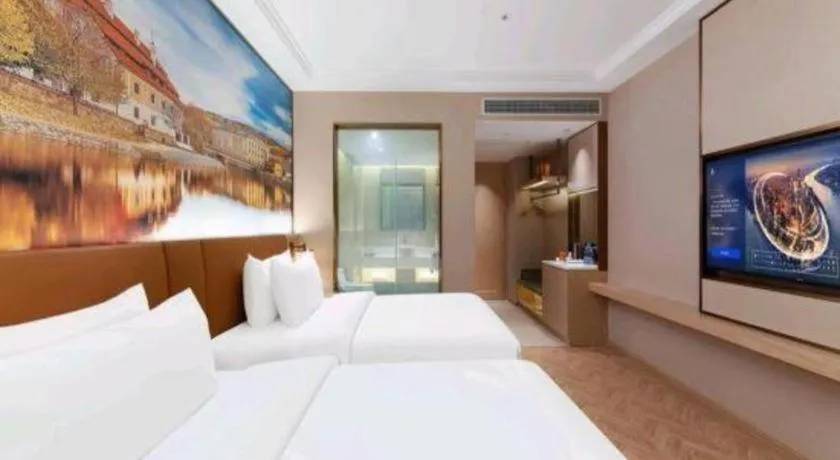 Bed in Vienna Hotel Yongzhou Dong'an High-Speed Railway Station