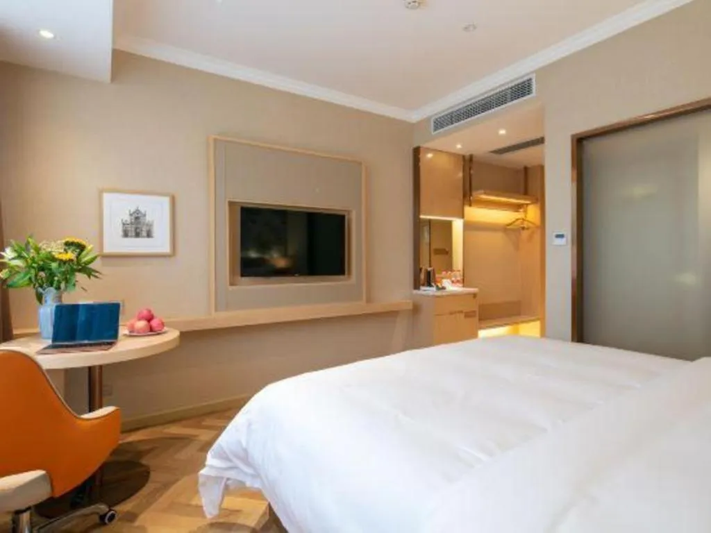 Bed in Vienna Hotel Yongzhou Dong'an High-Speed Railway Station