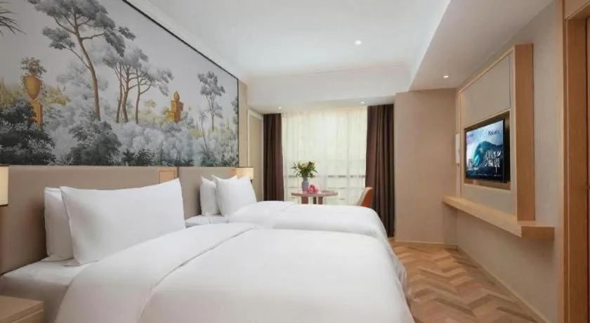 Bed in Vienna Hotel Yongzhou Dong'an High-Speed Railway Station