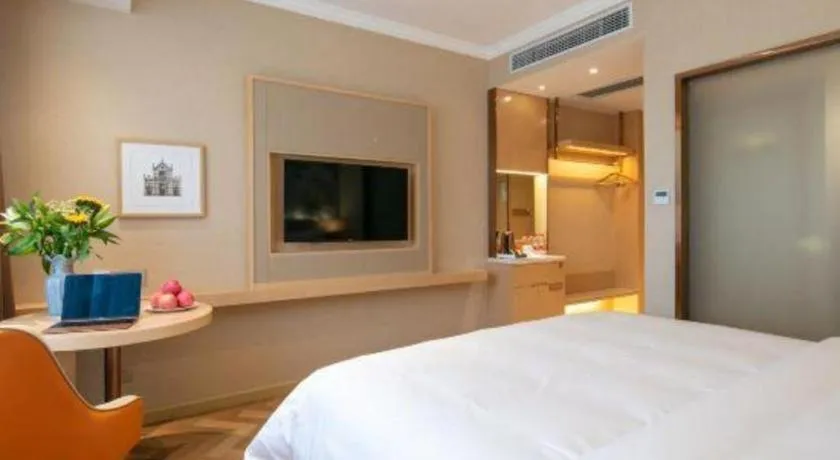 Bed in Vienna Hotel Yongzhou Dong'an High-Speed Railway Station