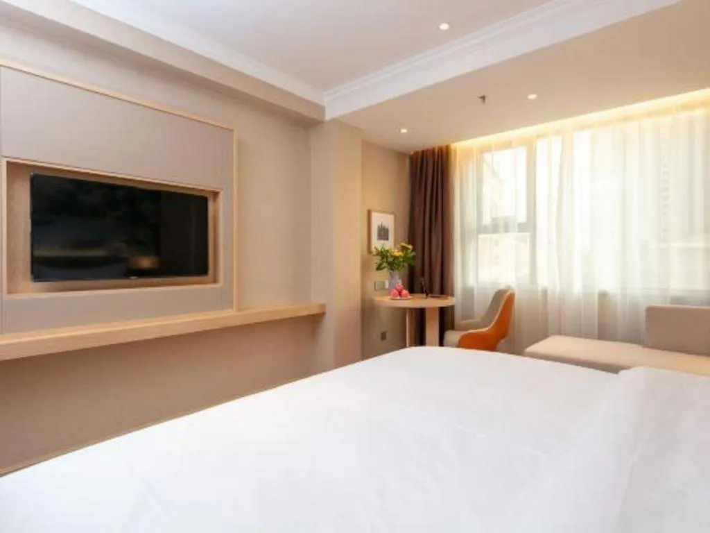 Bed in Vienna Hotel Yongzhou Dong'an High-Speed Railway Station