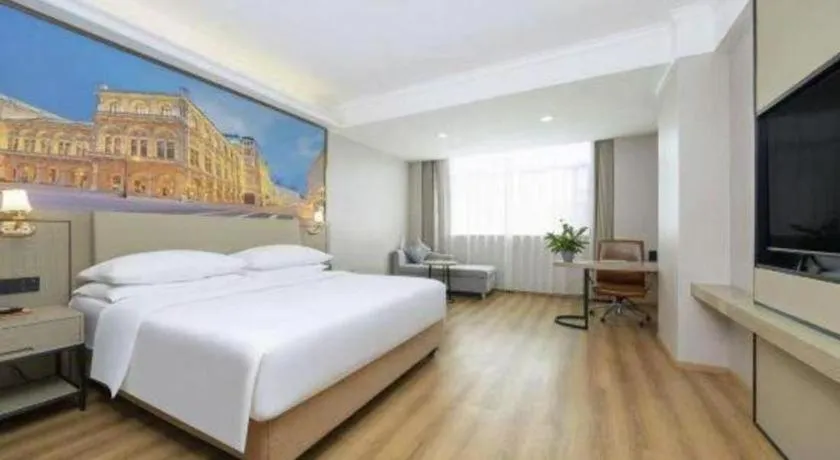 Bed in Vienna Hotel Yongzhou Dong'an High-Speed Railway Station