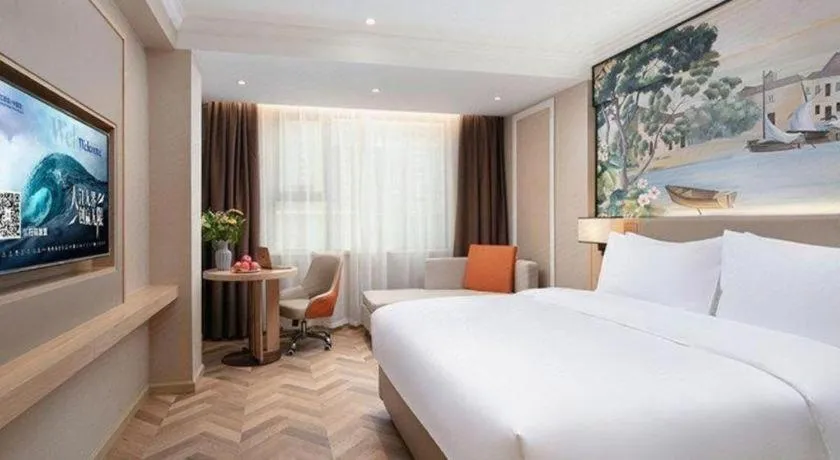 Bed in Vienna Hotel Yongzhou Dong'an High-Speed Railway Station