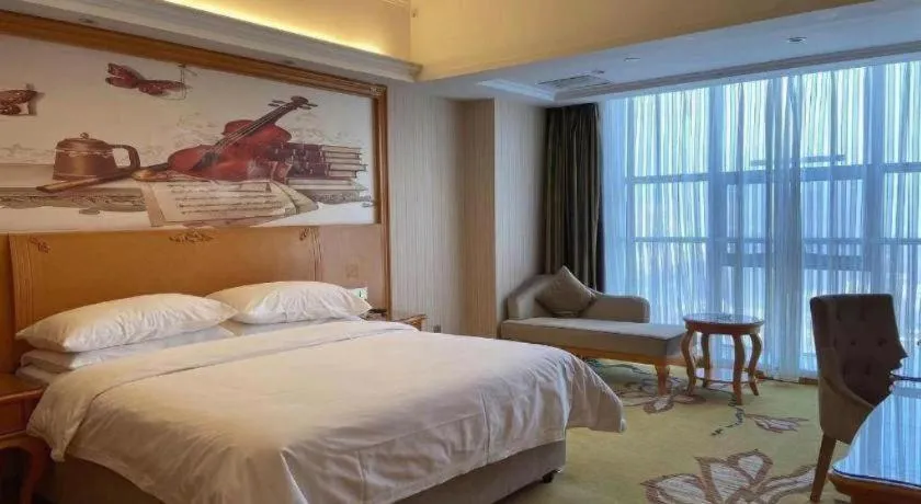 Bed in Vienna Hotel Henan Luoyang Jiudu Road Wanda