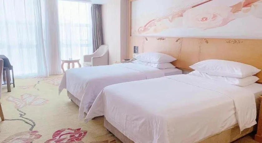 Bed in Vienna Hotel Henan Luoyang Jiudu Road Wanda