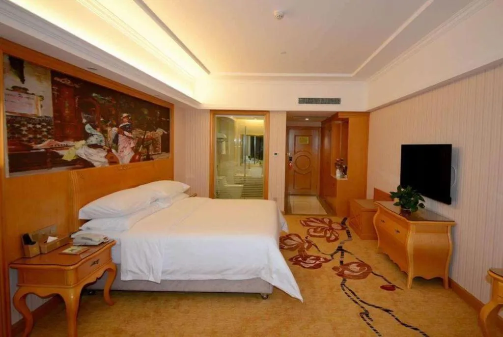 Bed in Vienna Hotel Henan Luoyang Jiudu Road Wanda