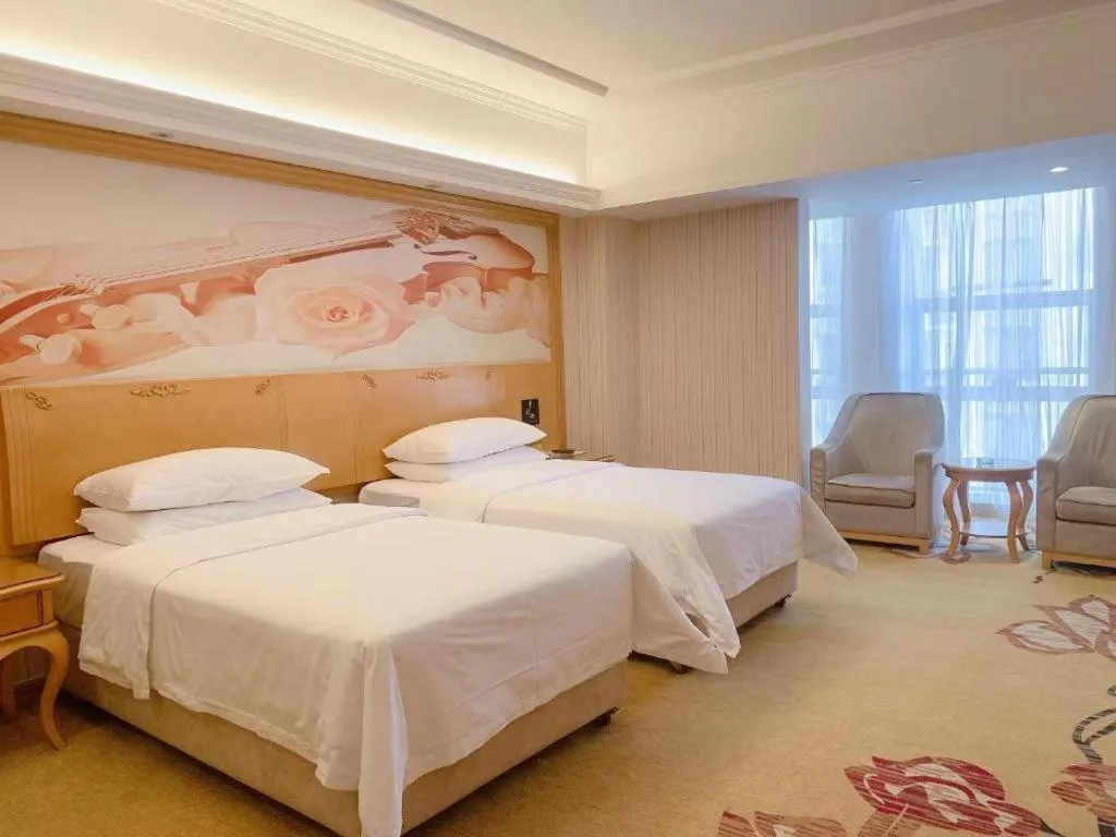 Bed in Vienna Hotel Henan Luoyang Jiudu Road Wanda