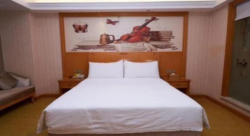 Bed in Vienna Hotel Henan Luoyang Jiudu Road Wanda