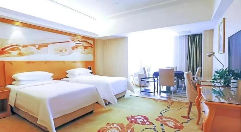 Bed in Vienna Hotel Henan Luoyang Jiudu Road Wanda