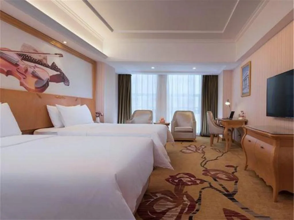 Bed in Vienna Hotel Henan Luoyang Jiudu Road Wanda