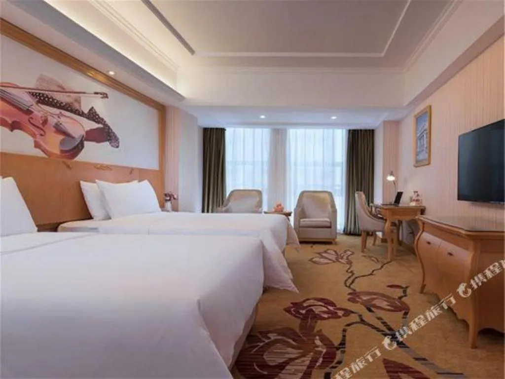 Bed in Vienna Hotel Henan Luoyang Jiudu Road Wanda