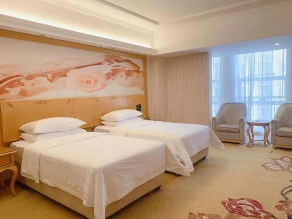 Bed in Vienna Hotel Henan Luoyang Jiudu Road Wanda