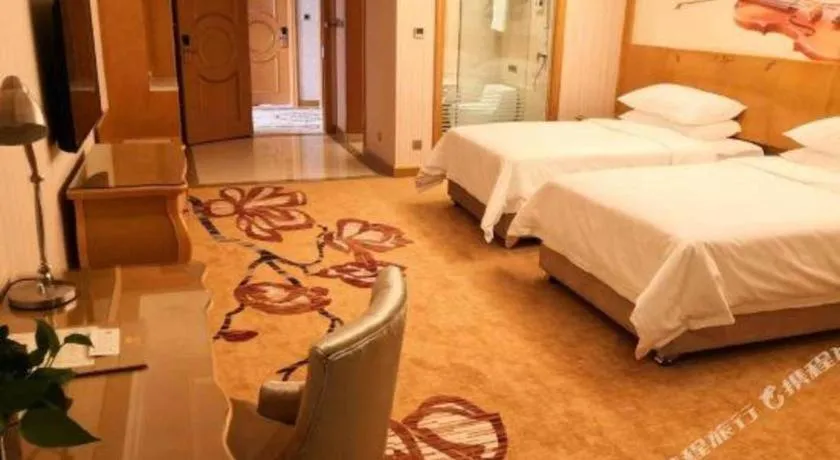 Bed in Vienna Hotel Henan Luoyang Jiudu Road Wanda