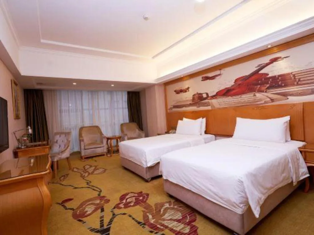 Bed in Vienna Hotel Henan Luoyang Jiudu Road Wanda