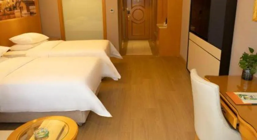 Bed in Vienna Hotel Henan Luoyang Jiudu Road Wanda