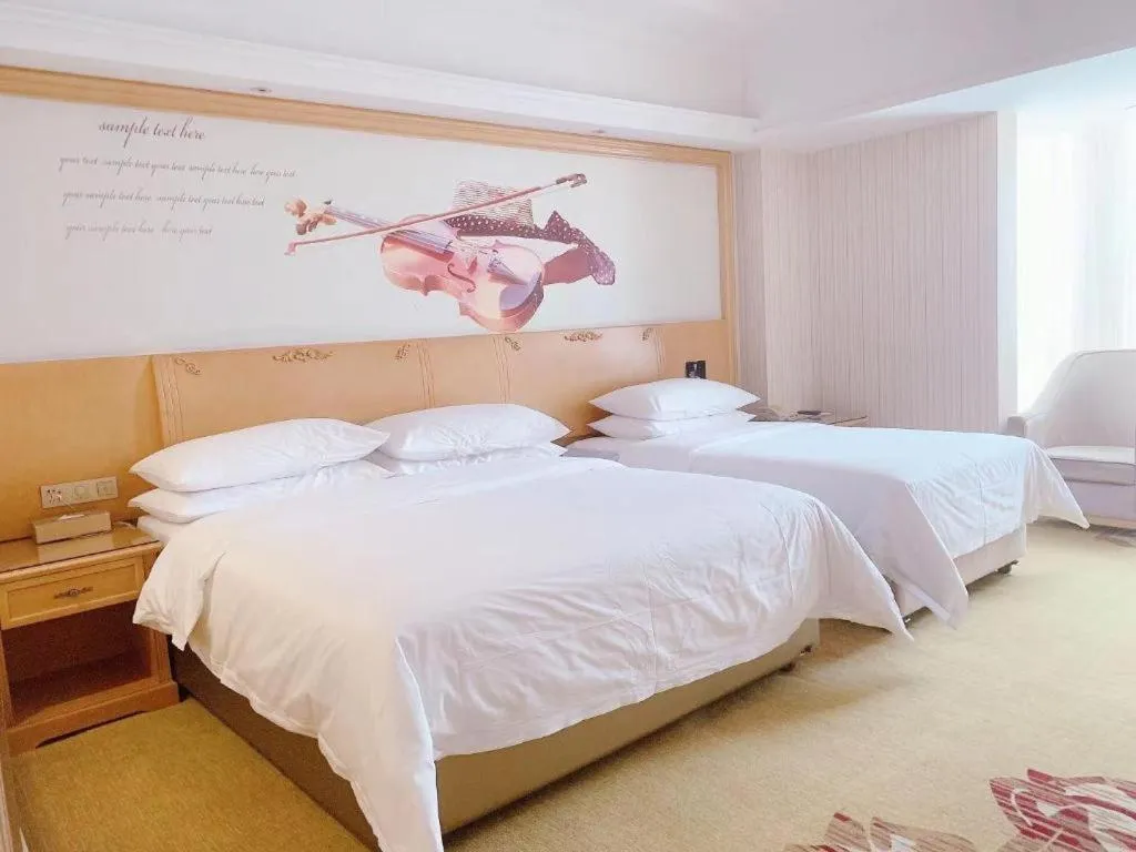Bed in Vienna Hotel Henan Luoyang Jiudu Road Wanda