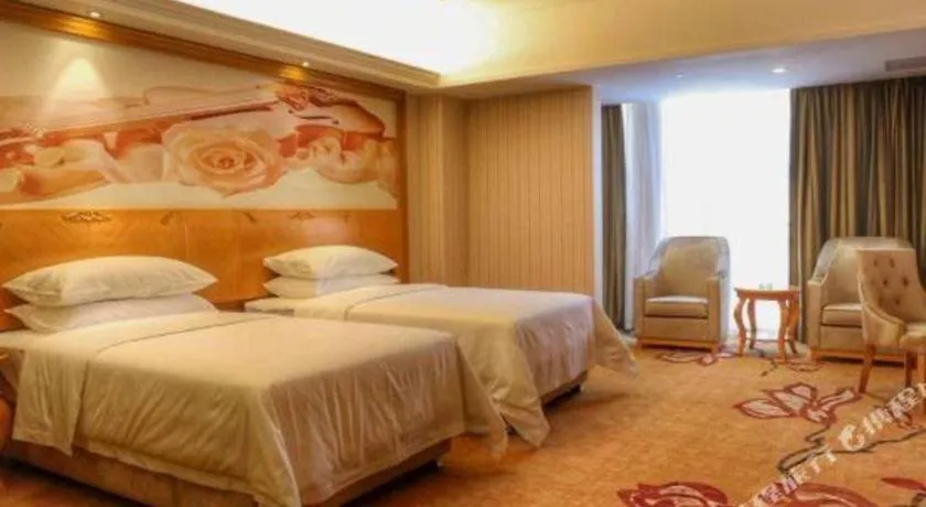 Bed in Vienna Hotel Henan Luoyang Jiudu Road Wanda