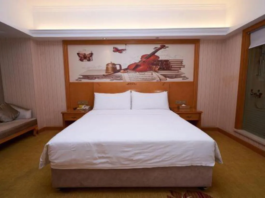Bed in Vienna Hotel Henan Luoyang Jiudu Road Wanda