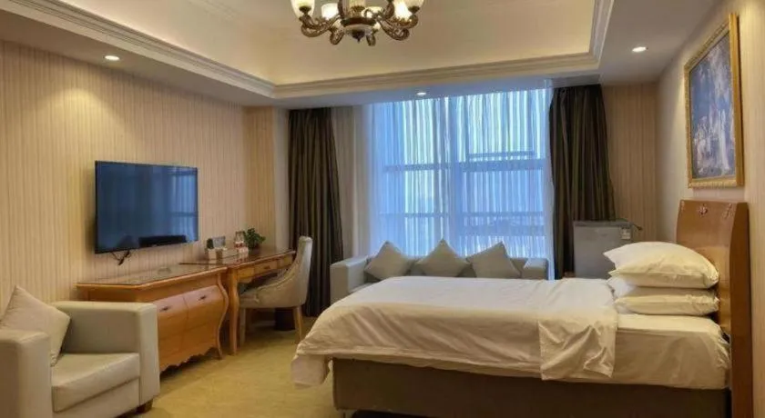 Bed in Vienna Hotel Henan Luoyang Jiudu Road Wanda