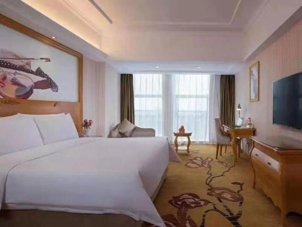 Bed in Vienna Hotel Henan Luoyang Jiudu Road Wanda