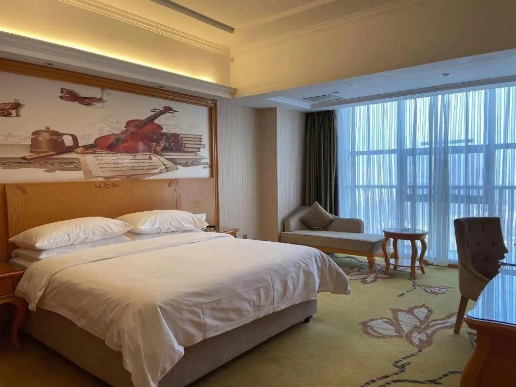 Bed in Vienna Hotel Henan Luoyang Jiudu Road Wanda