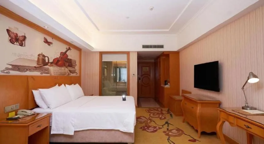 Bed in Vienna Hotel Henan Luoyang Jiudu Road Wanda