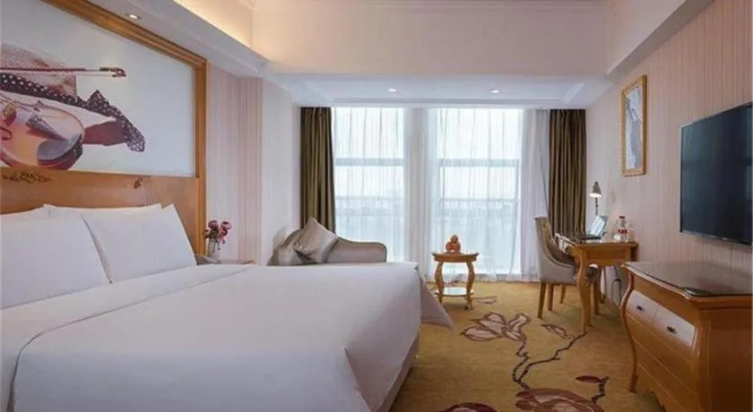 Bed in Vienna Hotel Henan Luoyang Jiudu Road Wanda