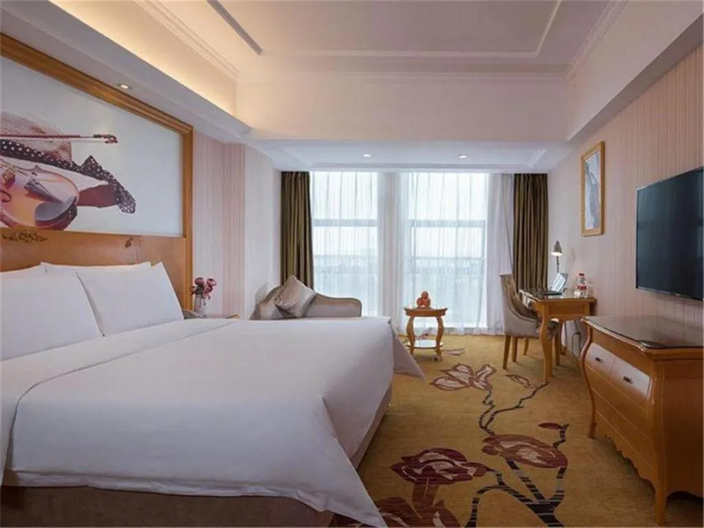 Bed in Vienna Hotel Henan Luoyang Jiudu Road Wanda