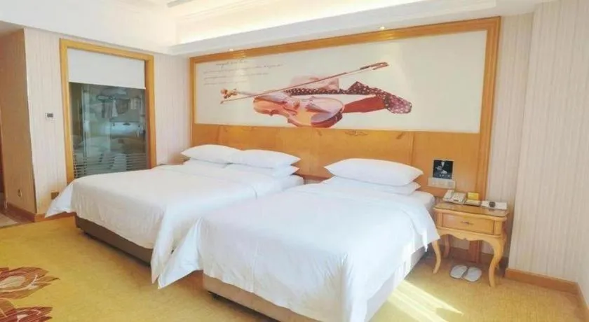 Bed in Vienna Hotel Henan Luoyang Jiudu Road Wanda